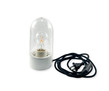 En lampa med genomskinlig kupa